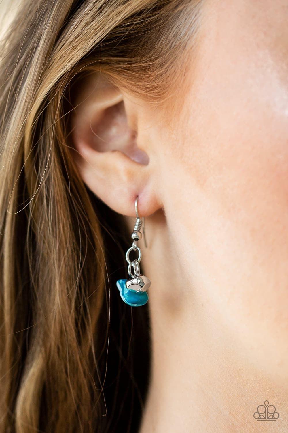 Paparazzi Accessories Pebble Pioneer - Blue Pebble Pioneer Blue. Two strands of refreshing blue pebbles and faceted silver beads swing from the bottoms of two layered chains, creating a colorful fringe below the collar. Features an adjustable clasp closur