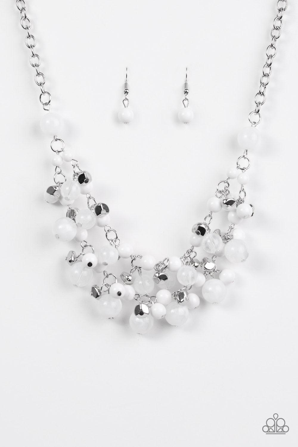 Paparazzi Accessories Gone Sailing - White Featuring polished and cloudy finishes, refreshing white beads drip from the bottom of two shimmery silver chains below the collar. Faceted silver beads trickle between the colorful accents, adding a splash of me