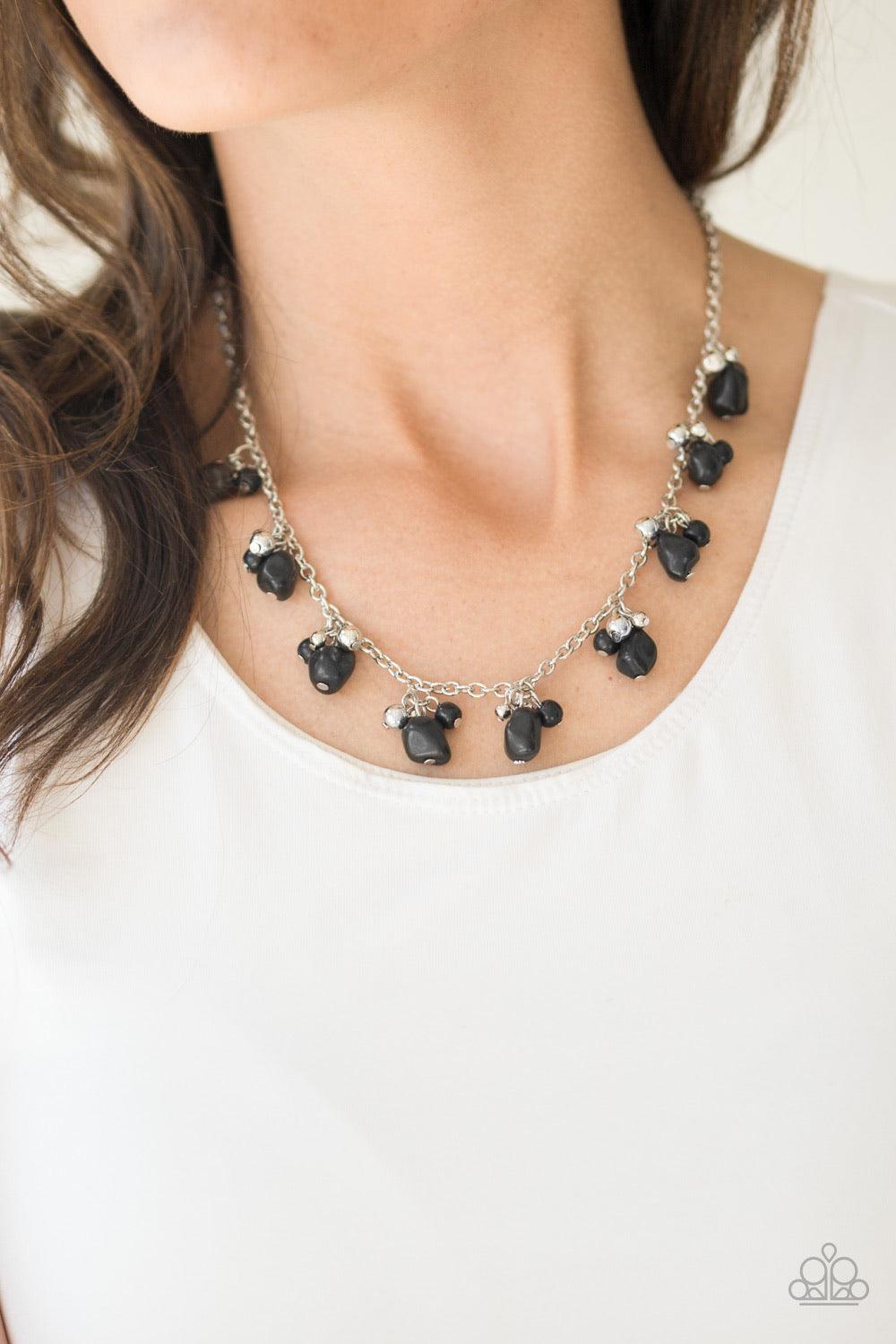 Paparazzi Accessories Rocky Mountain Magnificent - Black Varying in shape and size, shiny silver beads and earthy black stone beading swing from the bottom of a shimmery silver chain, creating a colorful fringe below the collar. Features an adjustable cla