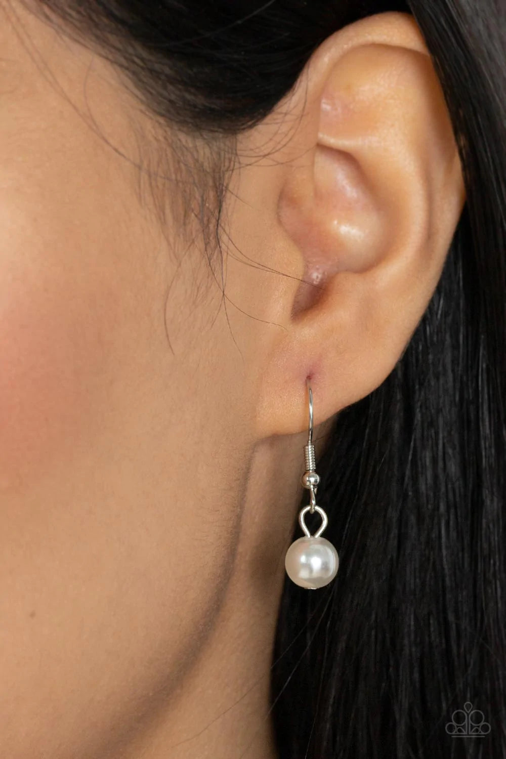 Paparazzi Accessories Drip Drop Dazzle - White Featuring an iridescent shimmer, a dramatically oversized crystal-like teardrop swings from the bottom of a cluster of shiny silver, pearly white, and crystal-like beads, creating a dazzling pendant at the bo