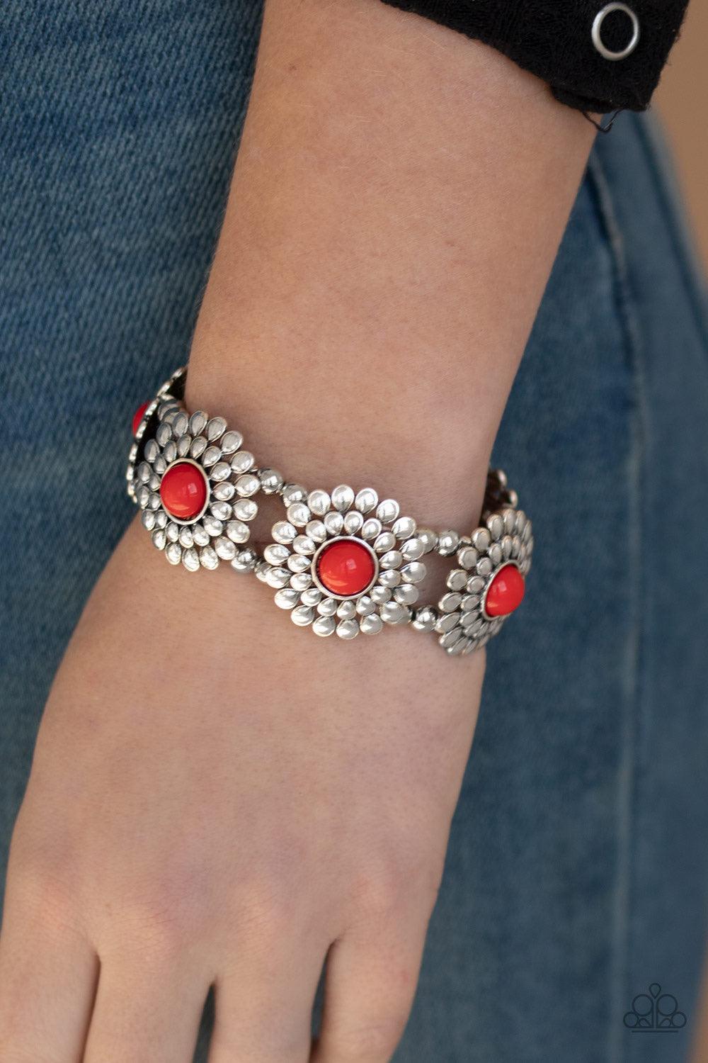 Paparazzi Accessories Bountiful Blossoms - Red Dotted with red beaded centers, silver petaled blossoms are threaded along a stretchy band around the wrist for a colorful look. Jewelry