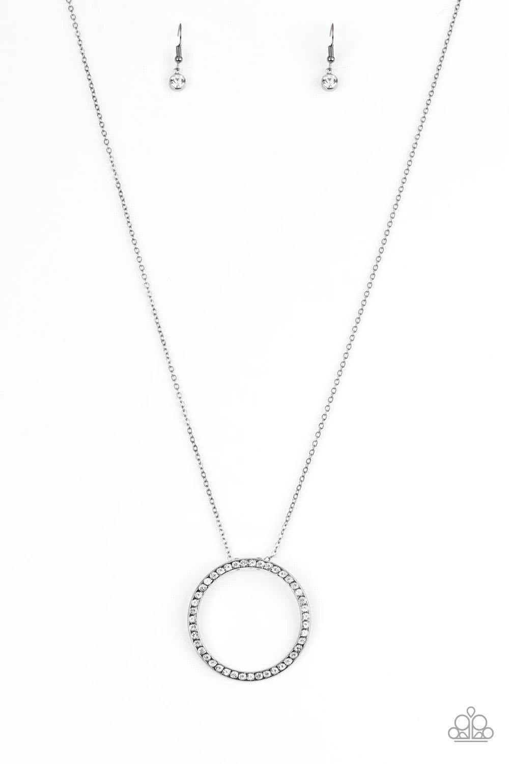 Paparazzi Accessories Center of Attention - Black Encrusted in glittery white rhinestones, a dramatic gunmetal hoop swings from the bottom of a lengthened gunmetal chain for a refined look. Features an adjustable clasp closure. Sold as one individual neck
