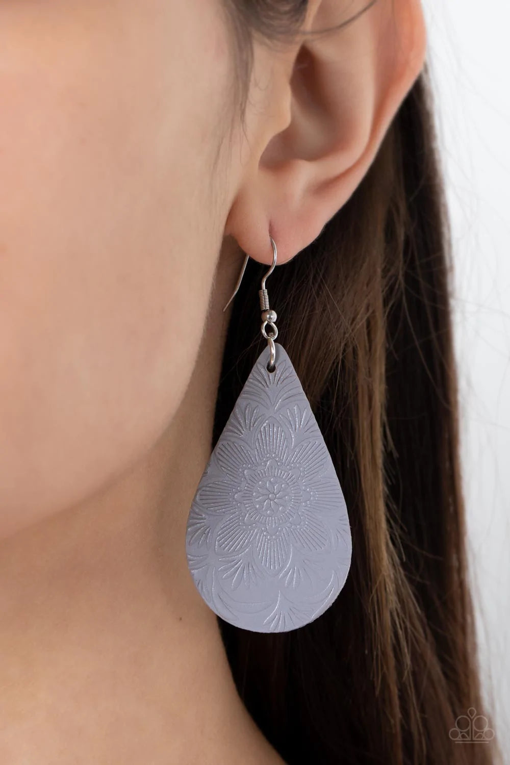 Paparazzi Accessories Subtropical Seasons - Silver Embossed in a tropical floral pattern, a distressed Ultimate Gray leather teardrop swings from the ear for a whimsically rustic flair. Earring attaches to a standard fishhook fitting. Sold as one pair of