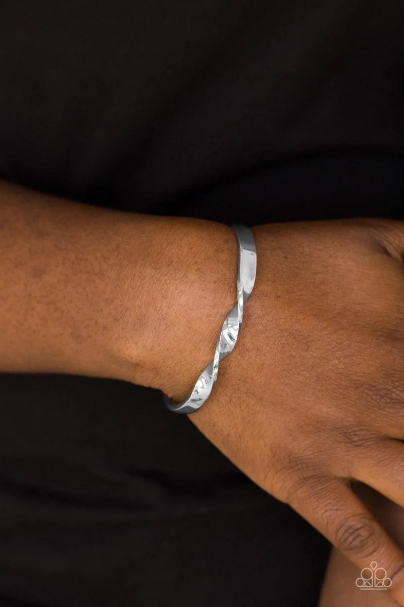 Paparazzi Accessories Traditional Twist - Silver Brushed in a high-sheen finish, a dainty silver bar subtly twists at the center, creating a casual cuff. Sold as one individual bracelet. Jewelry