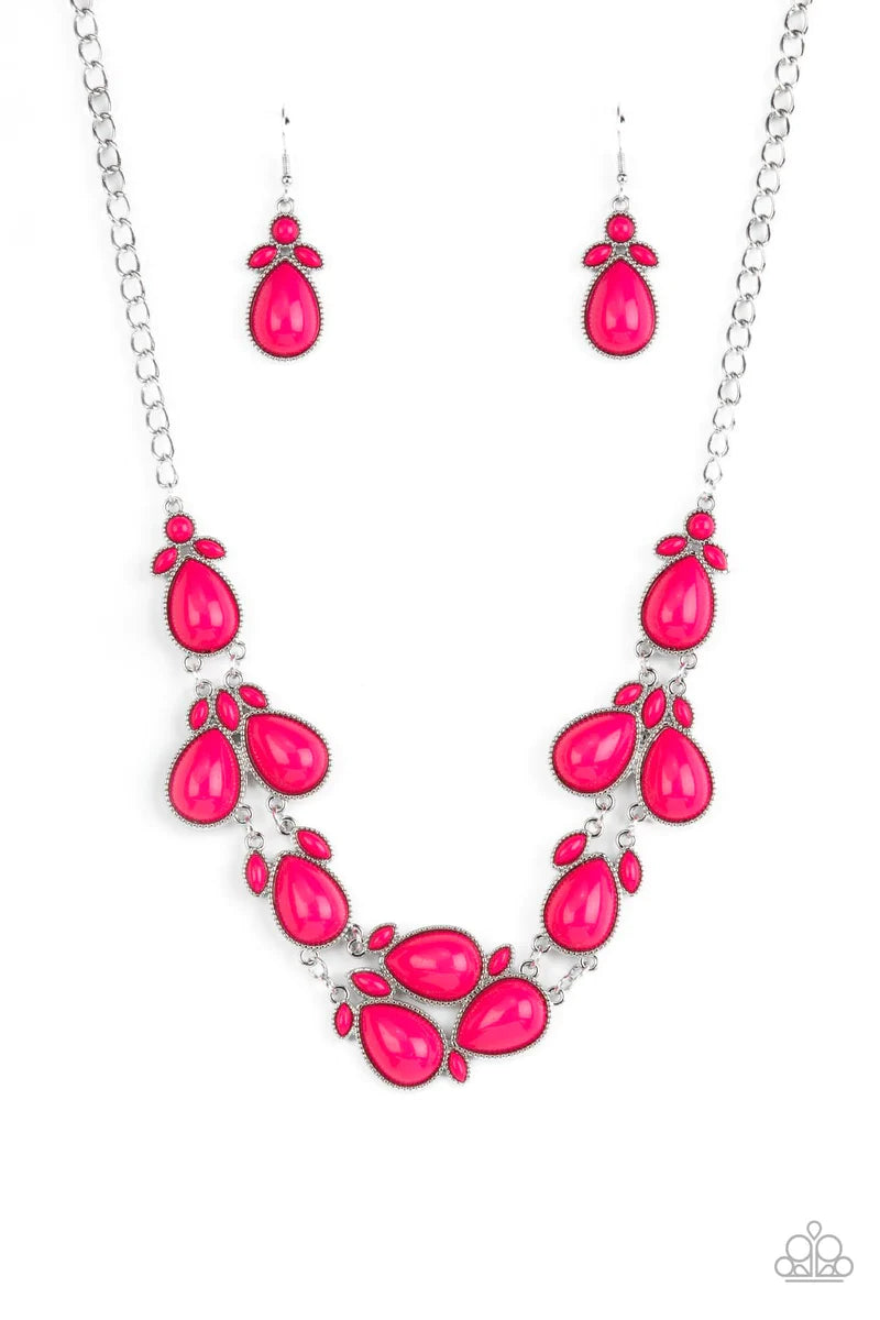 Paparazzi Accessories Botanical Banquet - Pink A flamboyant collection of bubbly pink round, teardrop, and marquise beads cluster in leafy frames below the collar for a flauntable pop of color. Features an adjustable clasp closure. Sold as one individual