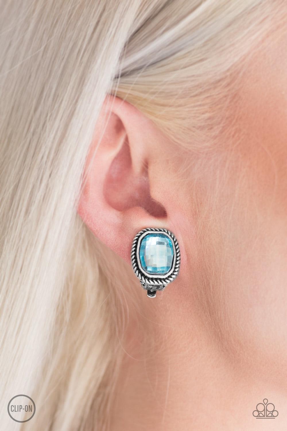 Paparazzi Accessories Beam Dream - Blue *Clip-On Faceted blue gems are pressed into textured silver frames for a refined look. Earring attaches to a standard clip-on fitting. Jewelry