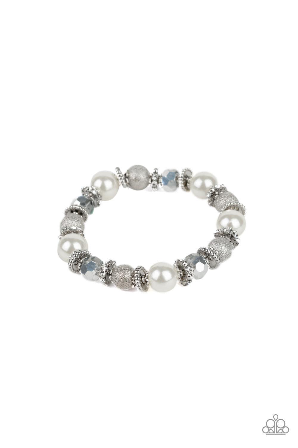 Paparazzi Accessories Sparking Conversation - White A sparkling collision of pearly white beads, shimmery silver accents, faceted metallic crystals, and white rhinestone encrusted rings are threaded along a stretchy band around the wrist for a refined fla