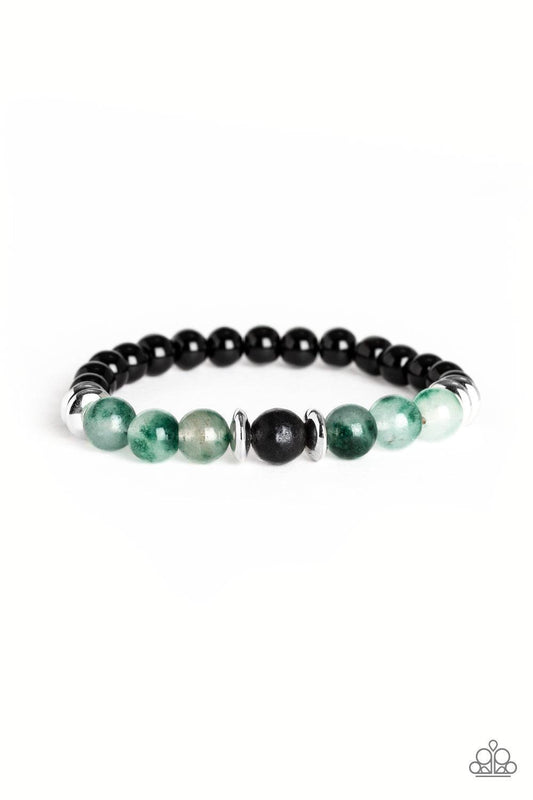 Paparazzi Accessories World Peace - Green An earthy assortment of shiny black beads, glassy green stone beads, glistening silver accents, and a single black lava rock bead are threaded along a stretchy band around the wrist for a refreshing look. Sold as