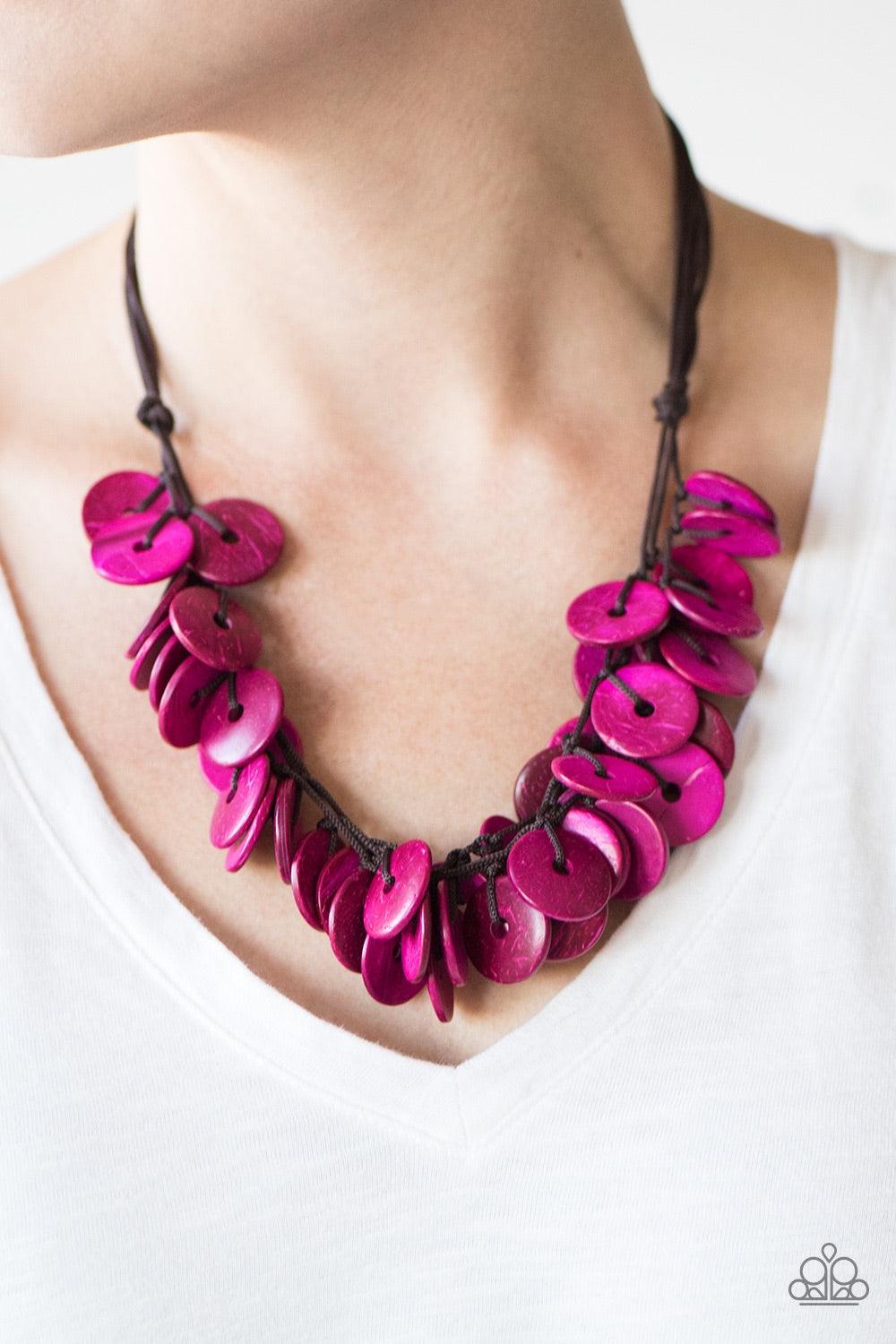 Paparazzi Accessories Jammin Jamaica - Pink Shiny wooden discs brushed in a refreshing pink finish trickle along shiny brown cording, creating clustered layers below the collar. Features a button-loop closure. Jewelry