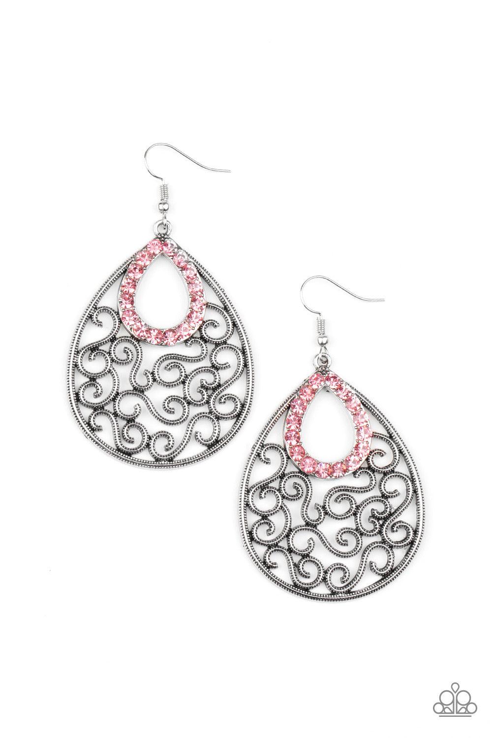 Paparazzi Accessories Seize The Stage - Pink A glittery pink rhinestone teardrop frame nestles at the top of an antiqued silver teardrop filled with whimsical vine-like filigree. Earring attaches to a standard fishhook fitting. Sold as one pair of earring