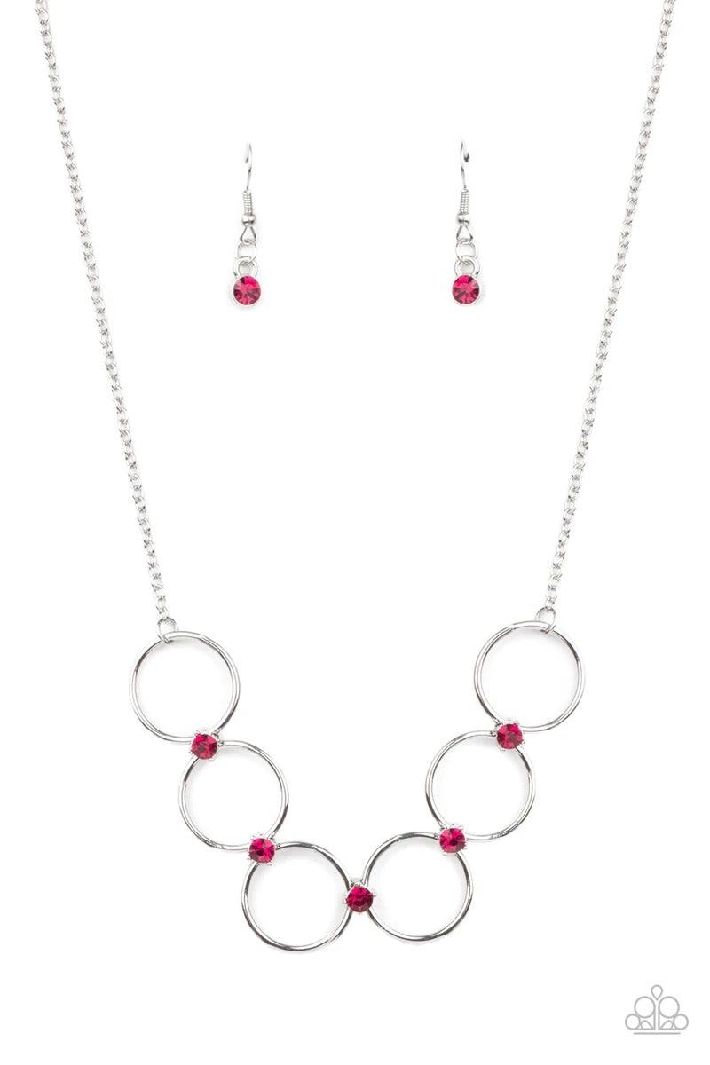 Paparazzi Accessories Regal Society - Pink Glittery pink rhinestones link a dainty row of silver rings below the collar, creating a regal minimalist inspired display. Features an adjustable clasp closure. Sold as one individual necklace. Includes one pair