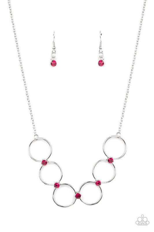 Paparazzi Accessories Regal Society - Pink Glittery pink rhinestones link a dainty row of silver rings below the collar, creating a regal minimalist inspired display. Features an adjustable clasp closure. Sold as one individual necklace. Includes one pair