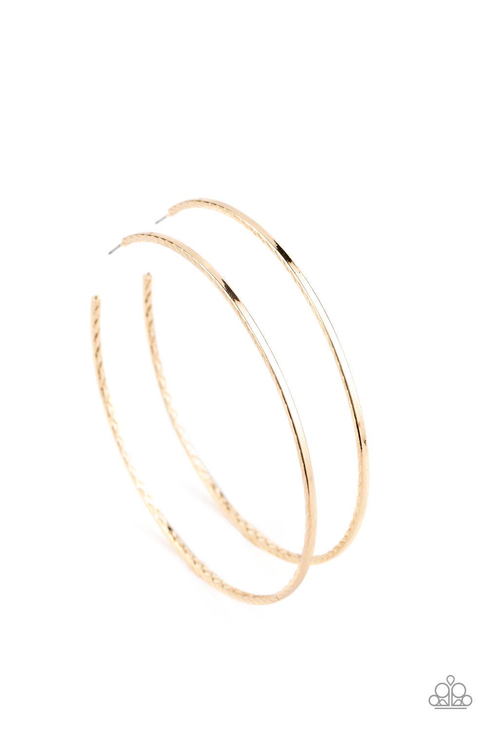 Paparazzi Accessories Diamondback Diva - Gold Etched in a diamond cut textures, a dramatically oversized shiny gold hoop curls around the ear for an exaggerated look. Earring attaches to a standard post fitting. Hoop measures approximately 3 1/2" in diame