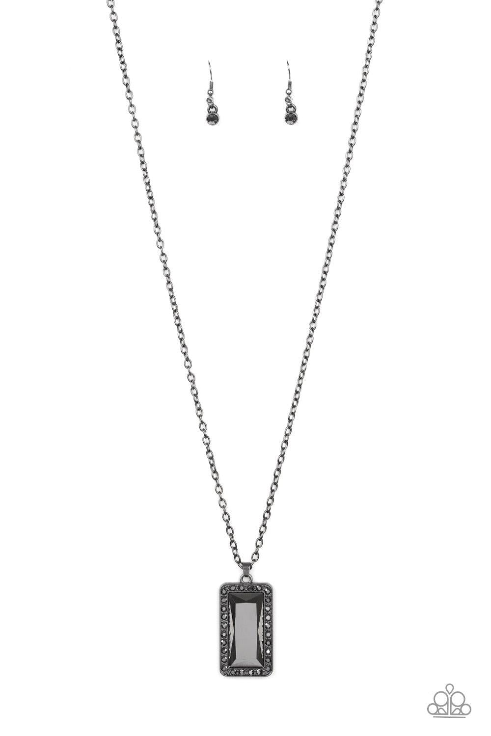 Paparazzi Accessories Bada BLING Bada Boom - Black Featuring a regal emerald style cut, a faceted hematite rhinestone is pressed into the center of a glistening gunmetal frame bordered by dainty hematite rhinestones. The dramatic pendant swings from the b