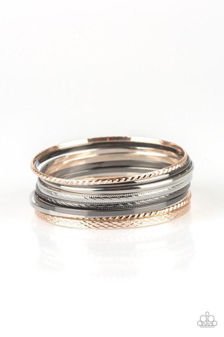 Paparazzi Accessories Am I Bright - Multi Featuring smooth and textured finishes, a collection of mismatched silver, rose gold, and gunmetal bangles stack across the wrist for a classic look. Jewelry