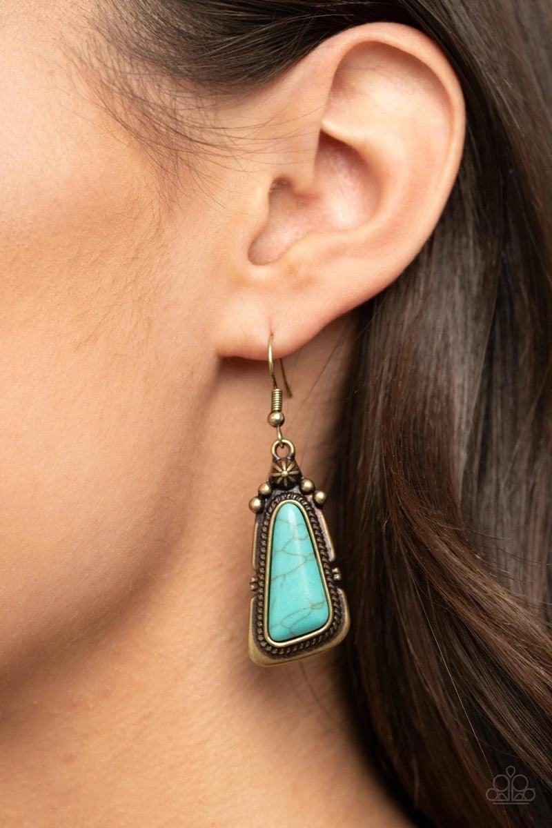 Paparazzi Accessories Sahara Solitude - Blue An imperfect turquoise stone is pressed into the center of a studded brass frame featuring brassy rope-like texture. Earring attaches to a standard fishhook fitting. Sold as one pair of earrings. Jewelry