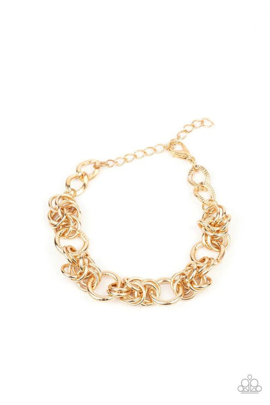 Paparazzi Accessories Big City Chic Gold: Spunky sections of mismatched gold links boldly interlock around the wrist, creating a gritty chain. Features an adjustable clasp closure. Sold as one individual bracelet. Silver: Spunky sections of mismatched sil