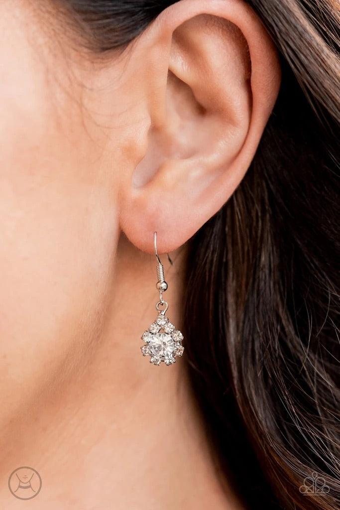 Paparazzi Accessories Princess Prominence - White A dainty strand of glittery white rhinestones encircle solitaire white rhinestones around the neck, creating a glitzy fringe. Features an adjustable clasp closure. Sold as one individual choker necklace. I