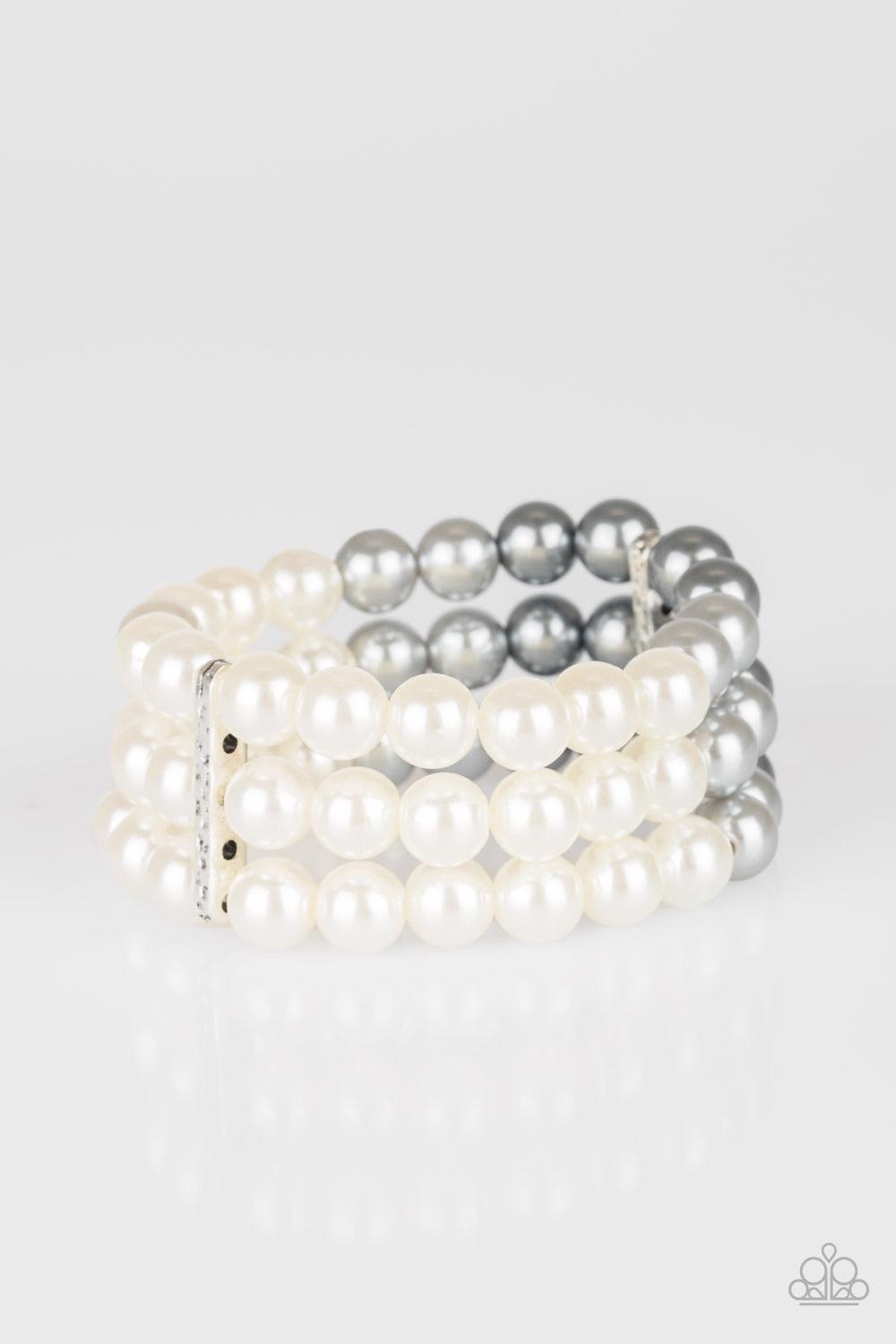Paparazzi Accessories Central Park Celebrity - Multi Joined together by a hammered silver fitting, white, silver, and dark gray pearls are threaded along stretchy bands, creating an elegant ombre effect around the wrist. Jewelry