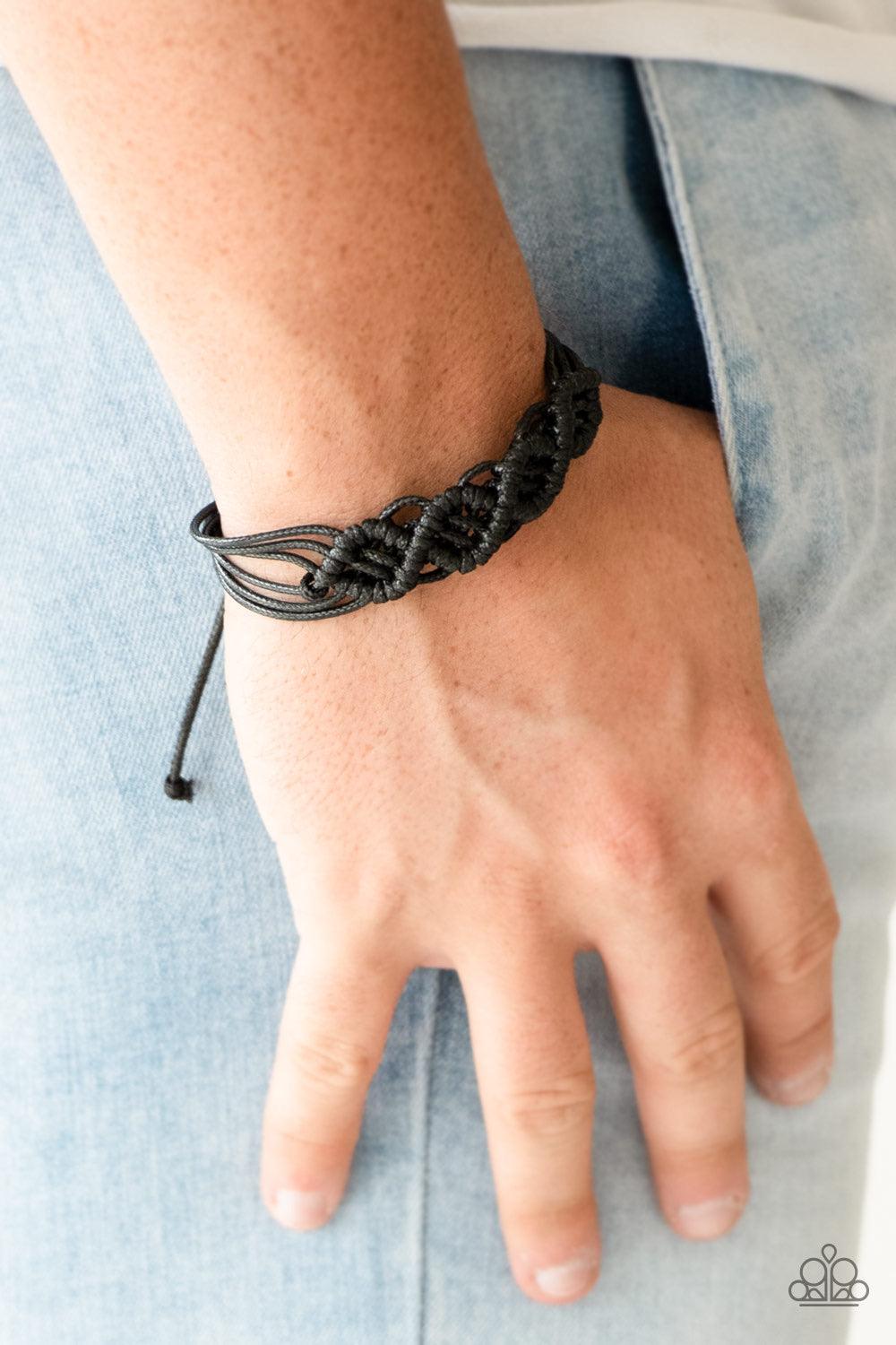 Paparazzi Accessories Boondocks and Bonfire - Black Strands of shiny black cording weaves and braids across the wrist for a rugged, nautical inspired look. Features an adjustable sliding knot closure. Sold as one individual bracelet. Jewelry