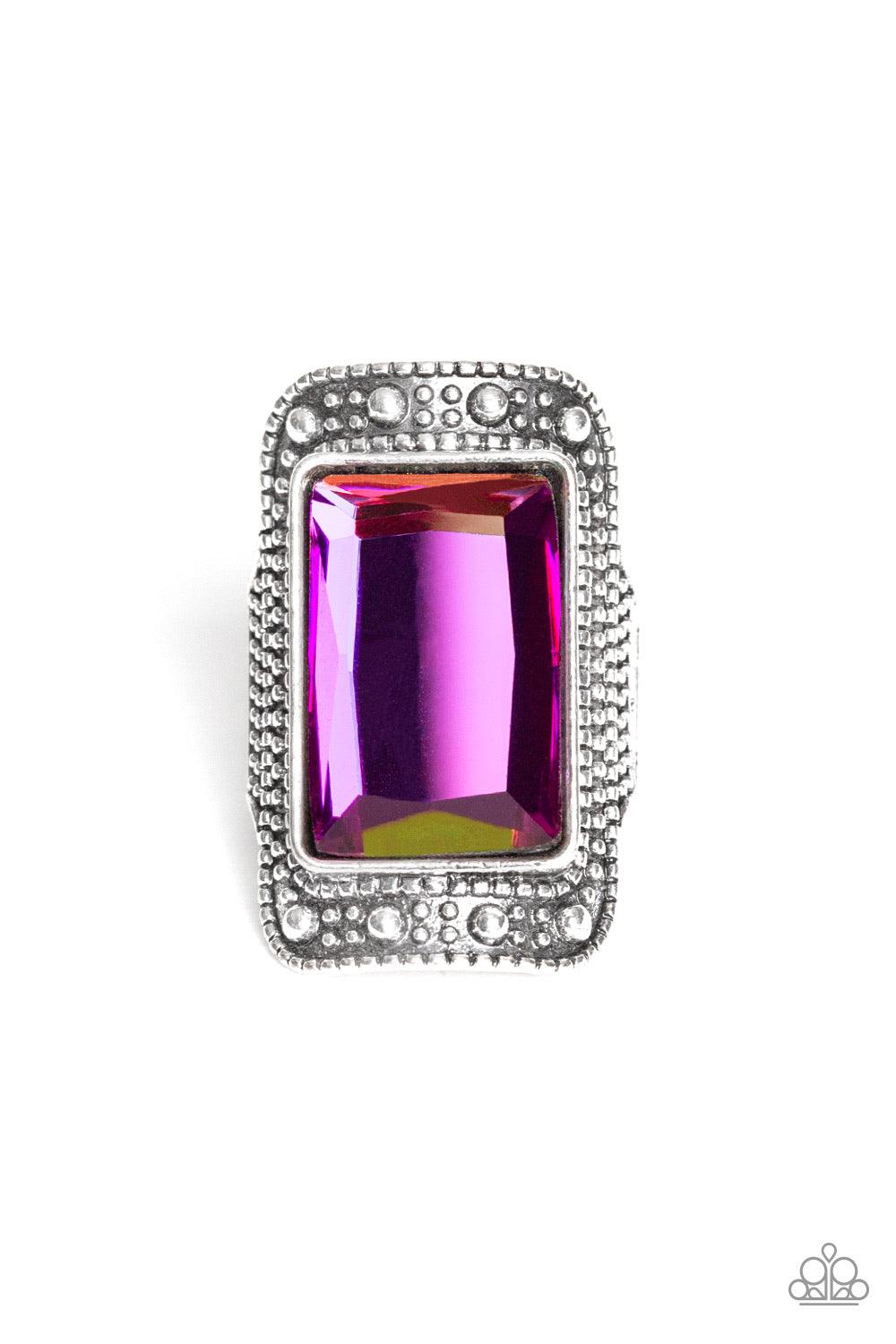 Paparazzi Accessories Very HEIR-descent ~Multi Featuring an iridescent oil spill finish, a dramatic emerald-cut gem is pressed into the center of a studded silver frame for a jaw-dropping look. Features a stretchy band for a flexible fit.