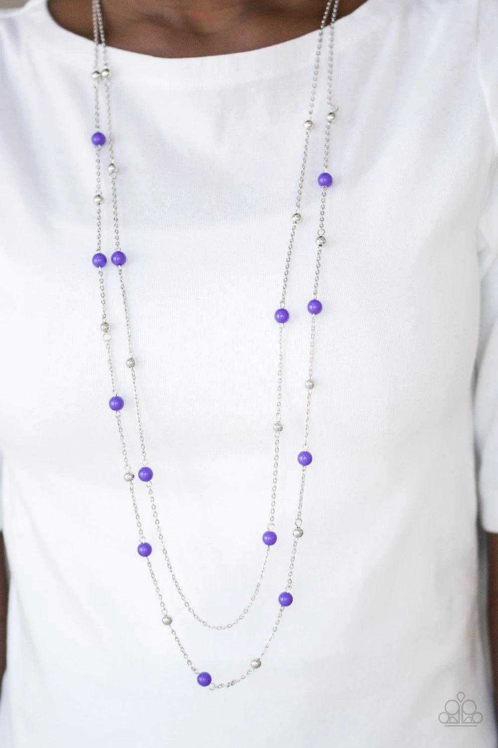 Paparazzi Accessories Beach Party Pageant - Purple Vivacious purple and dainty silver beads trickle along two shimmery silver chains, creating colorful layers down the chest. Features an adjustable clasp closure. Sold as one individual necklace. Includes