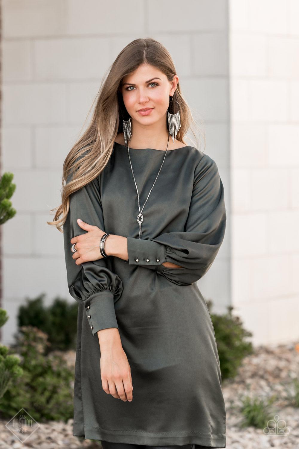 Paparazzi Accessories Raw Razzle - Black A dainty row of glassy white rhinestones is encrusted down the center of an imperfectly shaped gunmetal cuff, creating edgy shimmer around the wrist. Sold as one individual bracel Jewelry