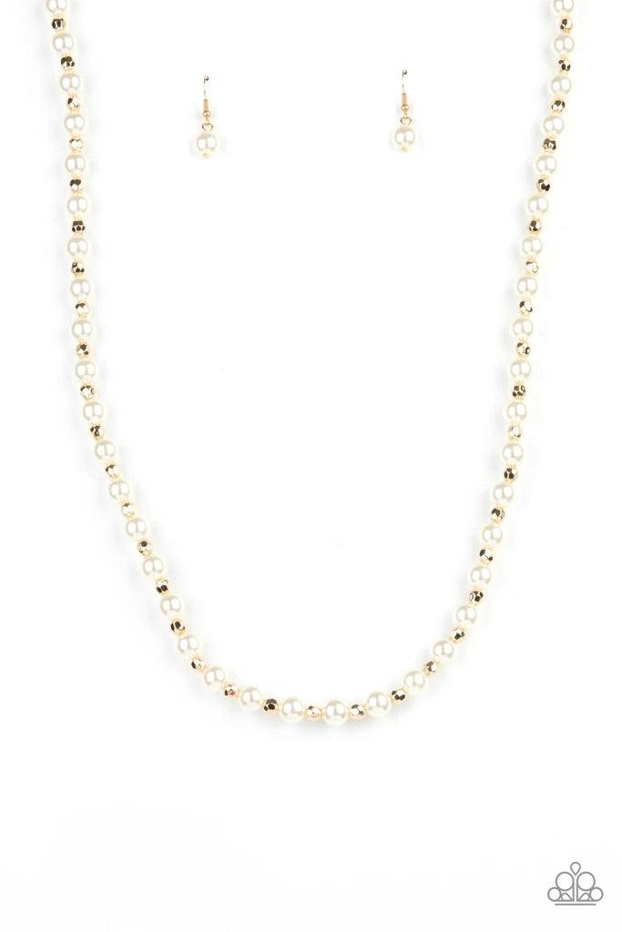 Paparazzi Accessories Nautical Novelty - White Classic white pearls and faceted gold beads alternate along an invisible wire below the collar, creating a timeless twist. Features an adjustable clasp closure. Sold as one individual necklace. Includes one p