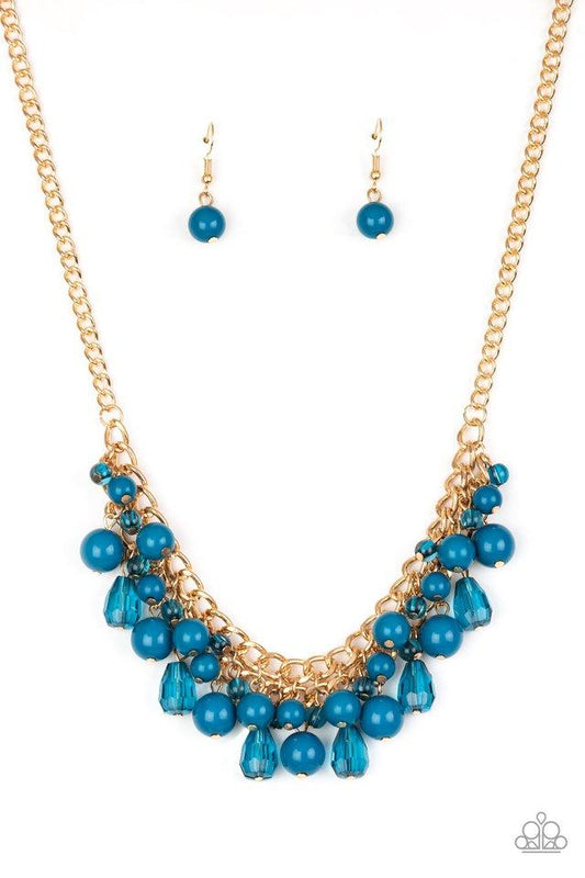 Paparazzi Accessories Tour De Trendsetter - Blue Varying in shape, glassy and polished blue beads swing from the bottom of interlocking gold chains. Crystal-like teardrops are sprinkled along the colorful beading, creating a flirtatious fringe below the c