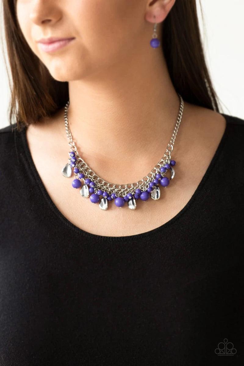 Paparazzi Accessories Summer Showdown - Purple Vivacious purple beads and curved silver teardrops swing from the bottom of interlocking silver chains, creating a flirtatious fringe below the collar. Features an adjustable clasp closure.Sold as one individ