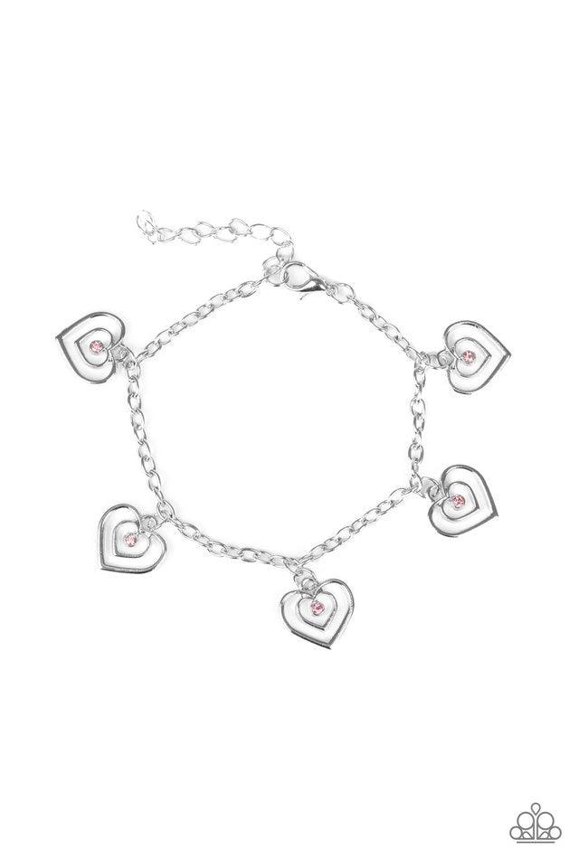 Paparazzi Accessories Unbreakable Hearts ~Pink Dotted with dainty pink rhinestone centers, spiraling silver heart chains swing from the wrist for a flirty look. Features an adjustable clasp closure. Sold as one individual bracelet.