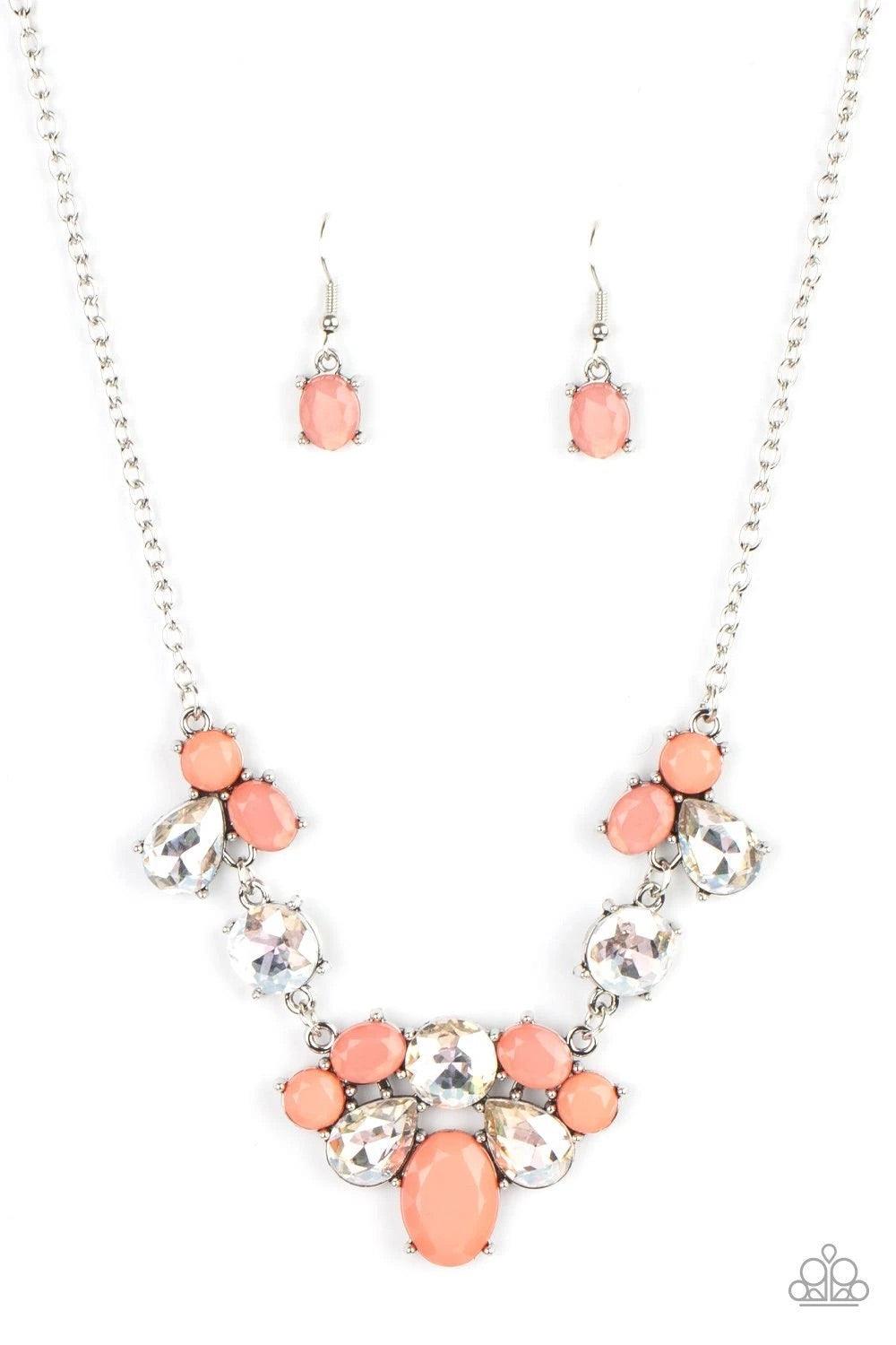 Paparazzi Accessories Ethereal Romance - Orange Varying in opacity and shape, mismatched pink beads attach to oversized white rhinestones, creating bubbly frames that delicately link into an ethereal display below the collar. Features an adjustable clasp