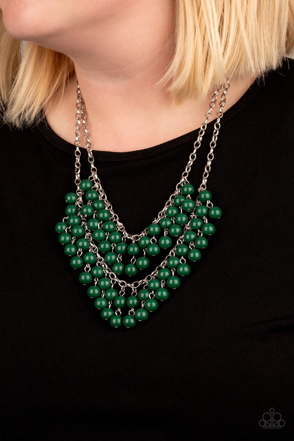 Paparazzi Accessories Bubbly Boardwalk - Green Pairs of green beads cascade from the bottoms of two silver chains, creating a vivaciously layered fringe below the collar. Features an adjustable clasp closure. Sold as one individual necklace. Includes one
