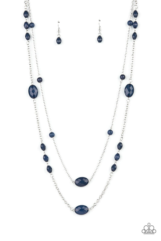 Paparazzi Accessories Day Trip Delights - Blue A pair of lengthened silver chains are accented with deep Navy Blue faceted beads in varying sizes for a delightfully whimsical display. Features an adjustable clasp closure. Sold as one individual necklace.