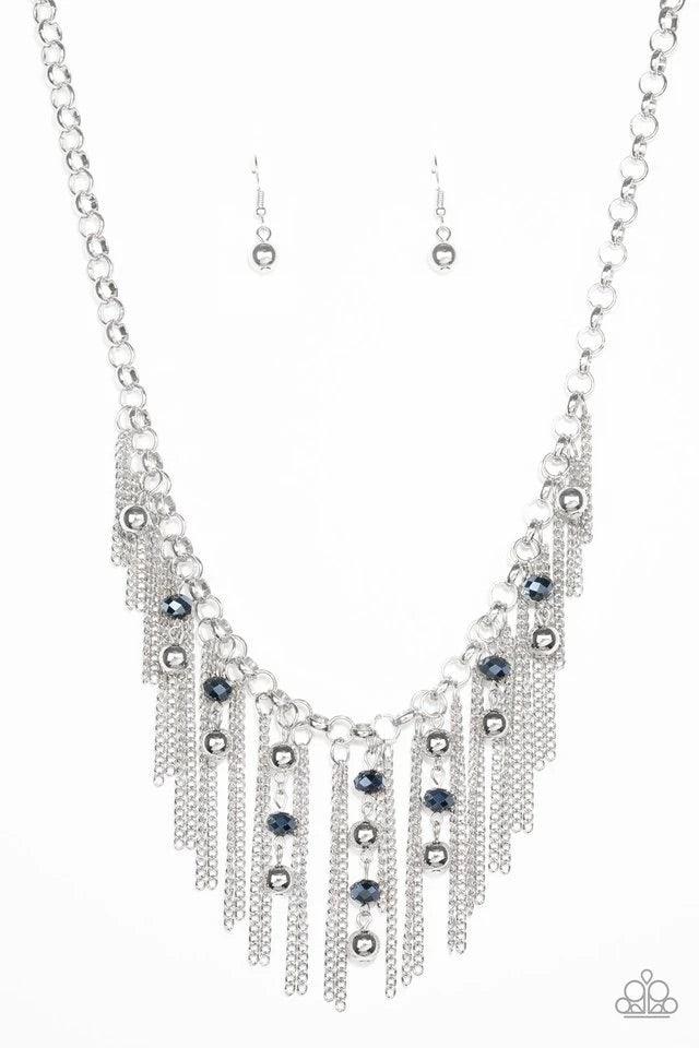 Paparazzi Accessories Ever Rebellious - Blue Glistening silver chains and strands of metallic blue crystal-like beads and glistening silver beads stream from the bottom of a bold silver chain, creating a sassy fringe below the collar. Features an adjustab