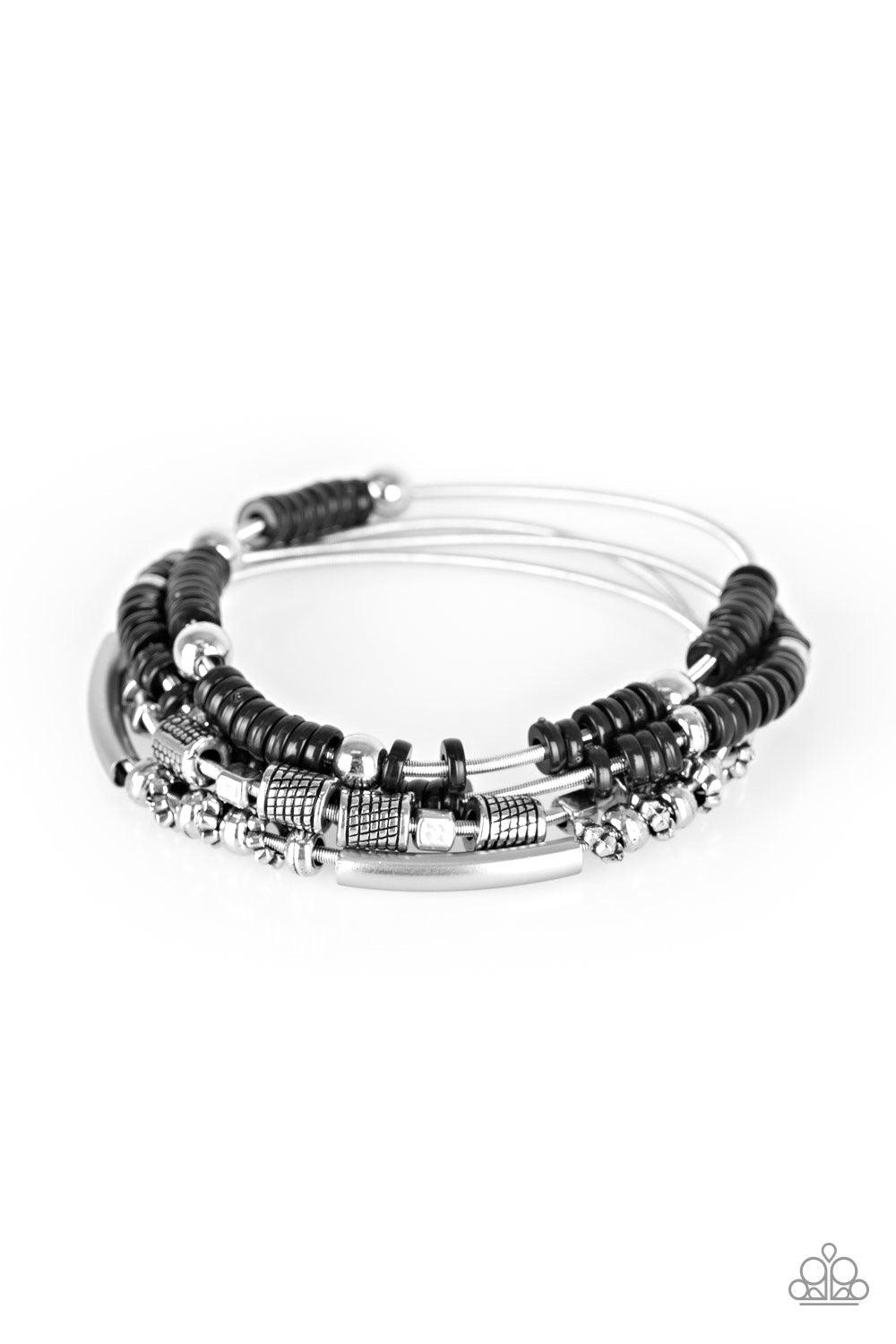 Paparazzi Accessories Tribal Spunk ~Black Mismatched silver accents and disc-shaped black beading slides along stretchy spring-like wires for a spunky tribal look. Sold as one set of four bracelets. Hostess Reward