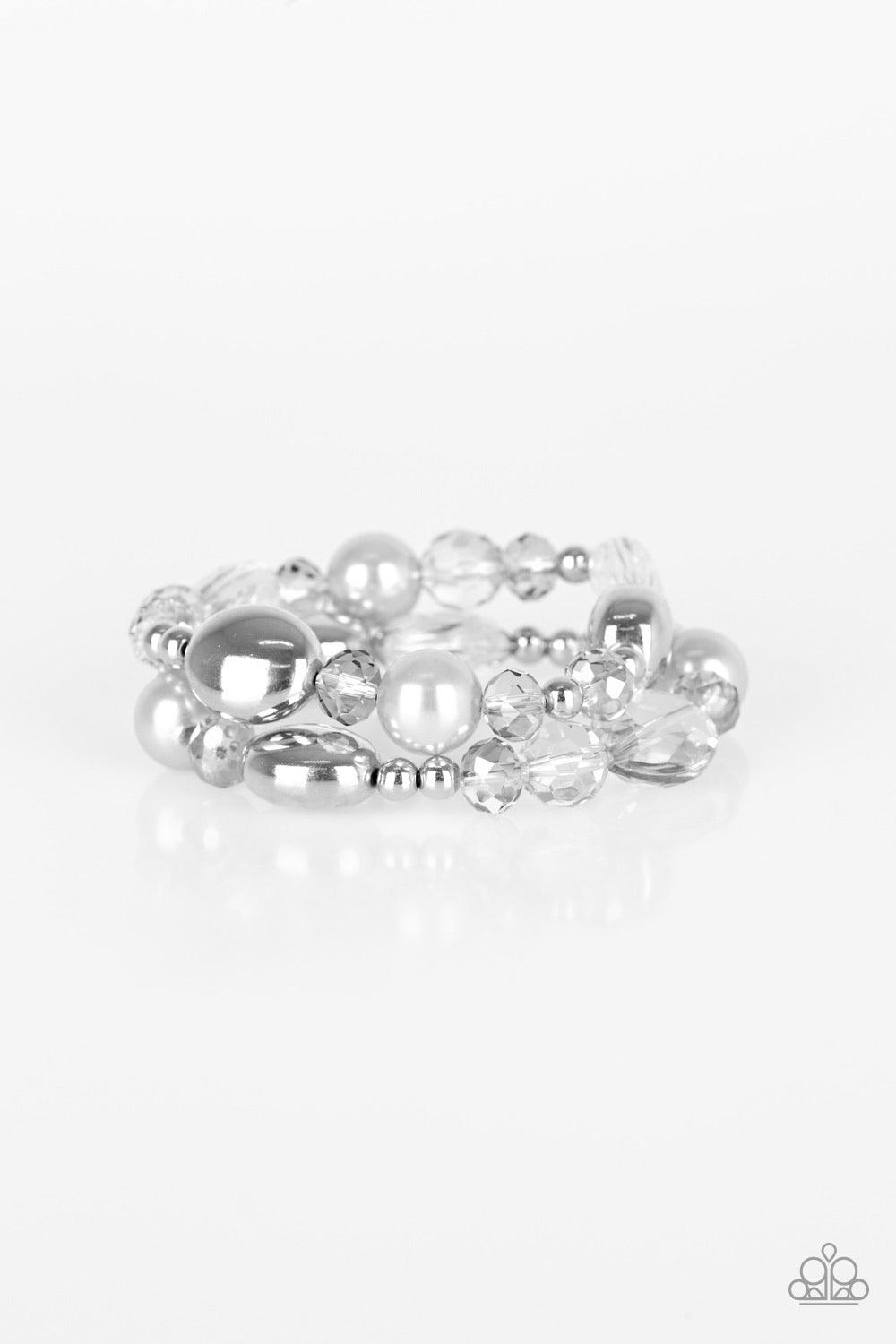 Paparazzi Accessories Downtown Dazzle - Silver An array of silver pearls, shiny silver beads, and smoky crystal-like beads are threaded along stretchy bands around the wrist for a refined look. Sold as one set of two bracelets. Jewelry