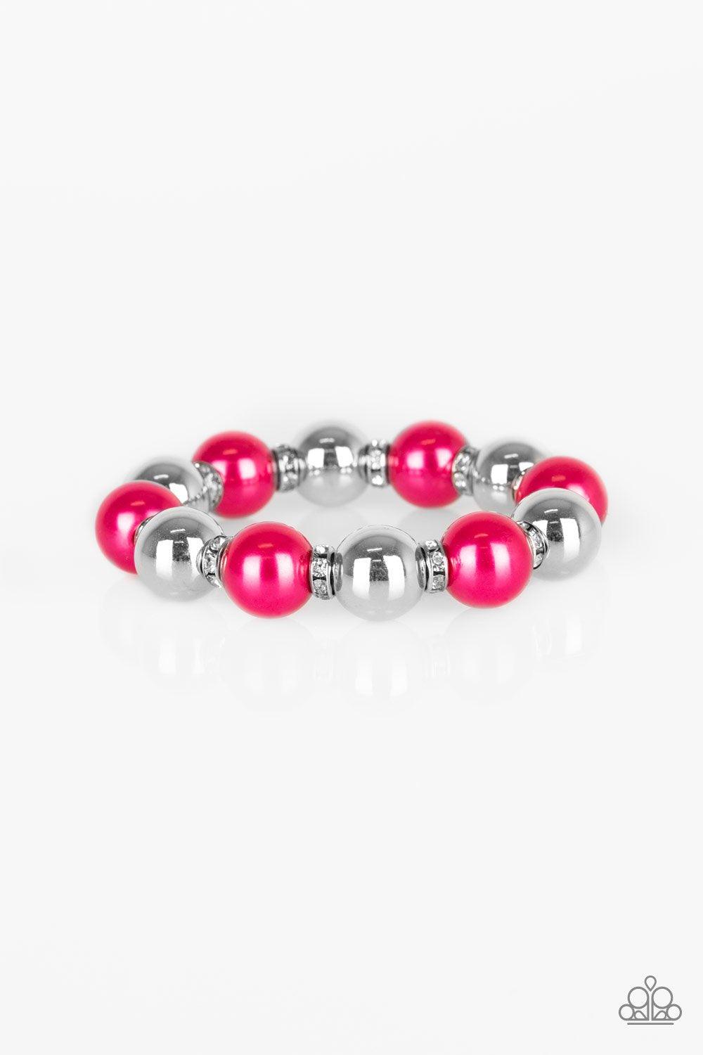 Paparazzi Accessories So Not Sorry - Pink A collection of white rhinestone encrusted rings, pink pearls, and classic silver beads are threaded along a stretchy band around the wrist for a glamorous look. Sold as one individual bracelet. Jewelry