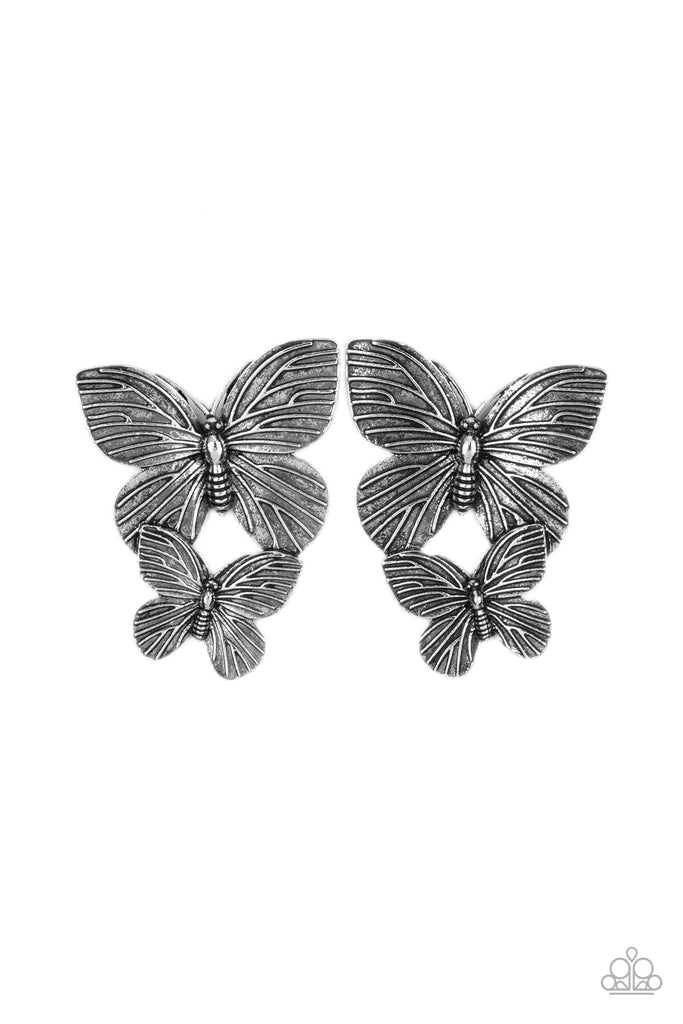 Paparazzi Accessories Blushing Butterflies - Silver Veined with lifelike textures, a pair of rustic silver butterflies flutters from the ear for a whimsical fashion. Earring attaches to a standard post fitting. Sold as one pair of post earrings. Jewelry