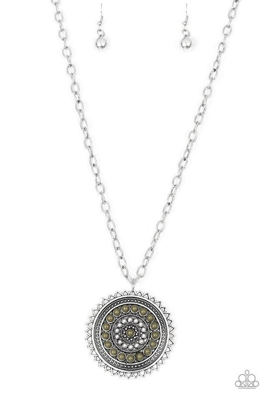 Paparazzi Accessories Lost SOL - Green Radiating with shimmery sunburst details, a Martini Olive beaded silver pendant swings from the bottom of a lengthened silver chain for a tribal inspired look. Features an adjustable clasp closure. Sold as one indivi