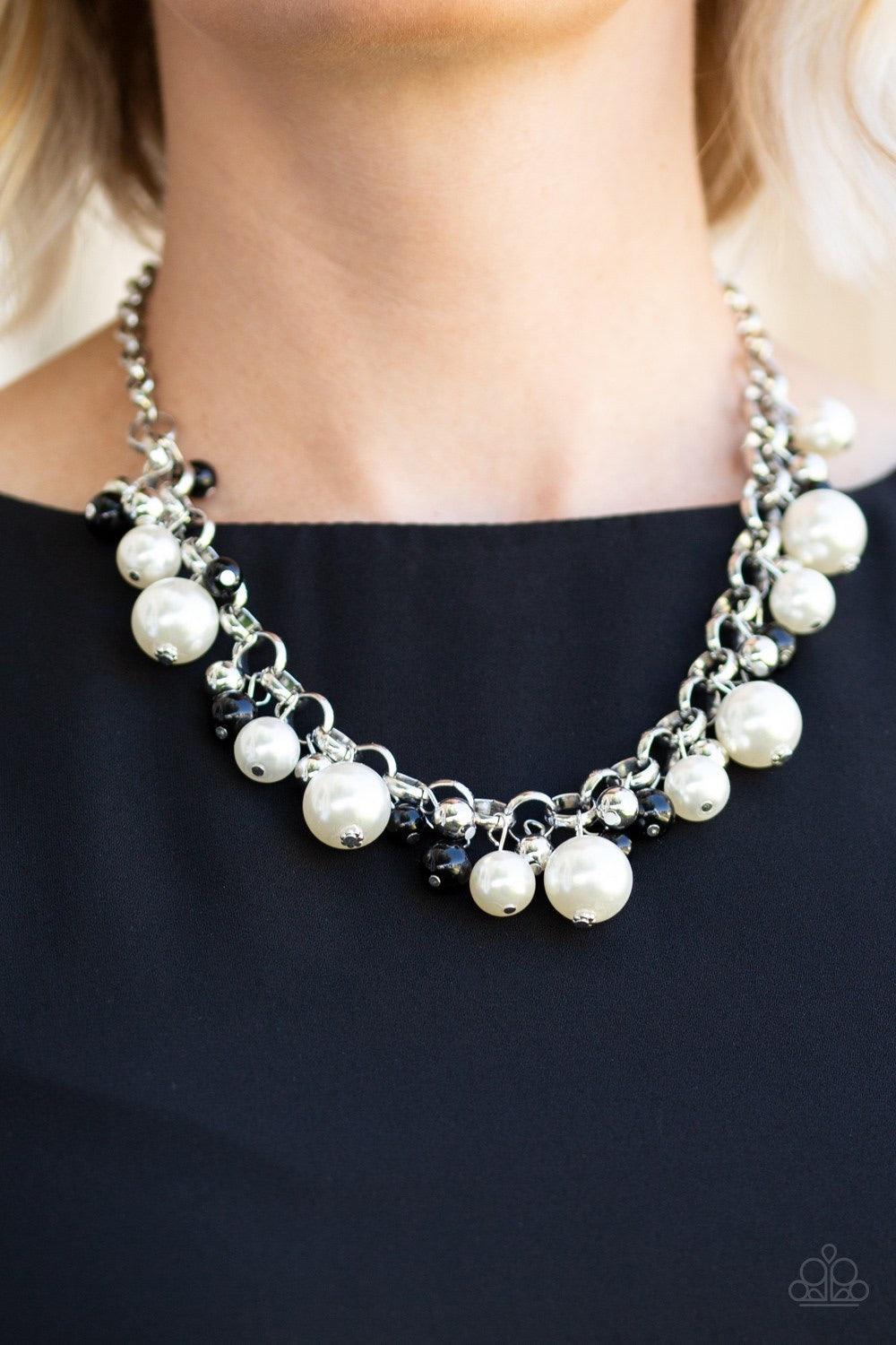 Paparazzi Accessories The Upstater - Black Varying in size, bubbly white pearls, classic silver beads, and shiny black beads swing from the bottom of a glistening silver chain, creating a refined fringe below the collar. Features an adjustable clasp closu