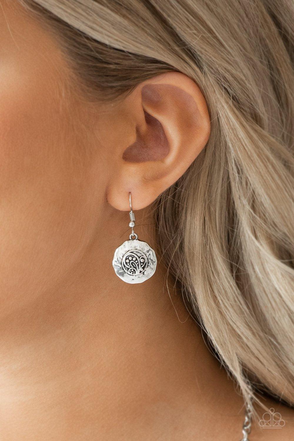 Paparazzi Accessories Bull In A China Shop - Silver Swirling with ornate filigree filled detail, a shimmery silver crescent plate swings below the collar for a fierce look. Features an adjustable clasp closure. Sold as one individual necklace. Includes on