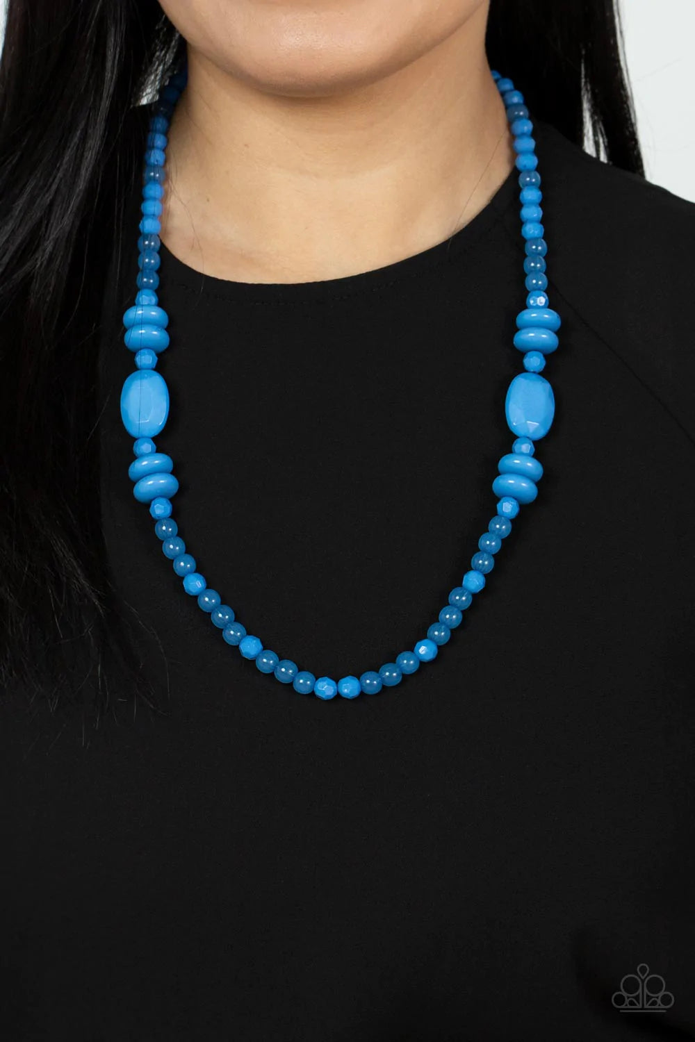 Paparazzi Accessories Tropical Tourist - Blue Varying in size, shape, and opacity, a refreshingly blue collection of cloudy and solid acrylic beads drapes across the chest for a playful pop of color. Features an adjustable clasp closure. Sold as one indiv