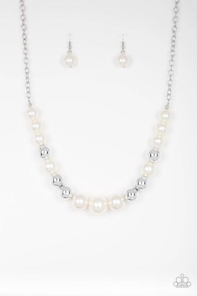 Paparazzi Accessories Take Note - White A collection of oversized silver and pearly white beads drape across the chest for a refined look. Features an adjustable clasp closure. Sold as one individual necklace. Includes one pair of matching earrings. Jewel