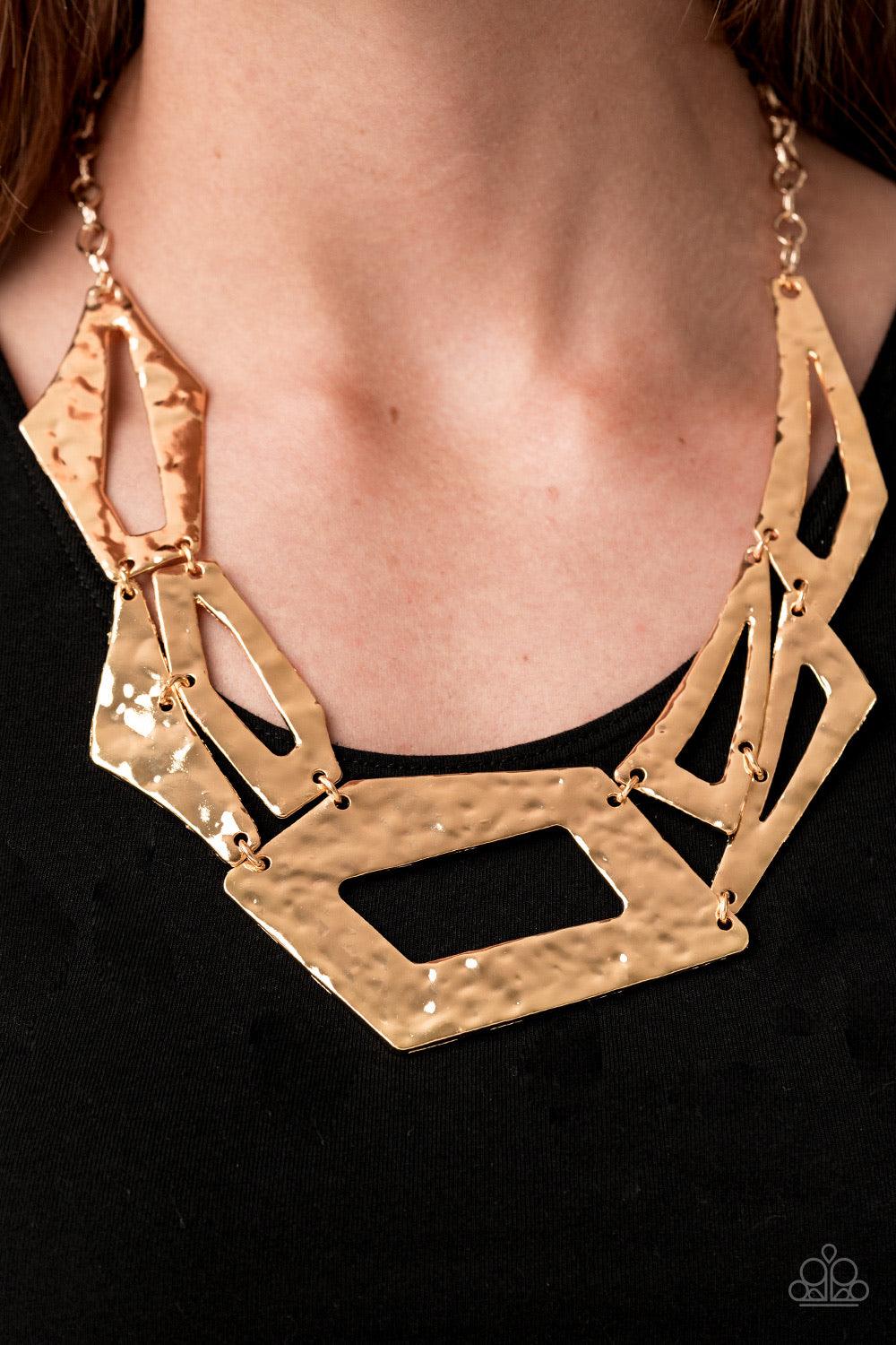 Paparazzi Accessories Break the Mold - Gold Attached to an edgy gold chain, hammered gold plates featuring asymmetrical shapes abstractly link below the collar for a knockout look. Features an adjustable clasp closure. Jewelry