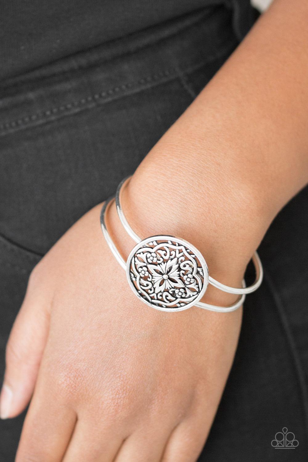 Paparazzi Accessories Mandala Majesty - Silver Brushed in a high-sheen finish, shiny silver filigree spins into a mandala like frame atop a dainty cuff for a whimsical look. Features a hinged closure. Sold as one individual bracelet. Jewelry