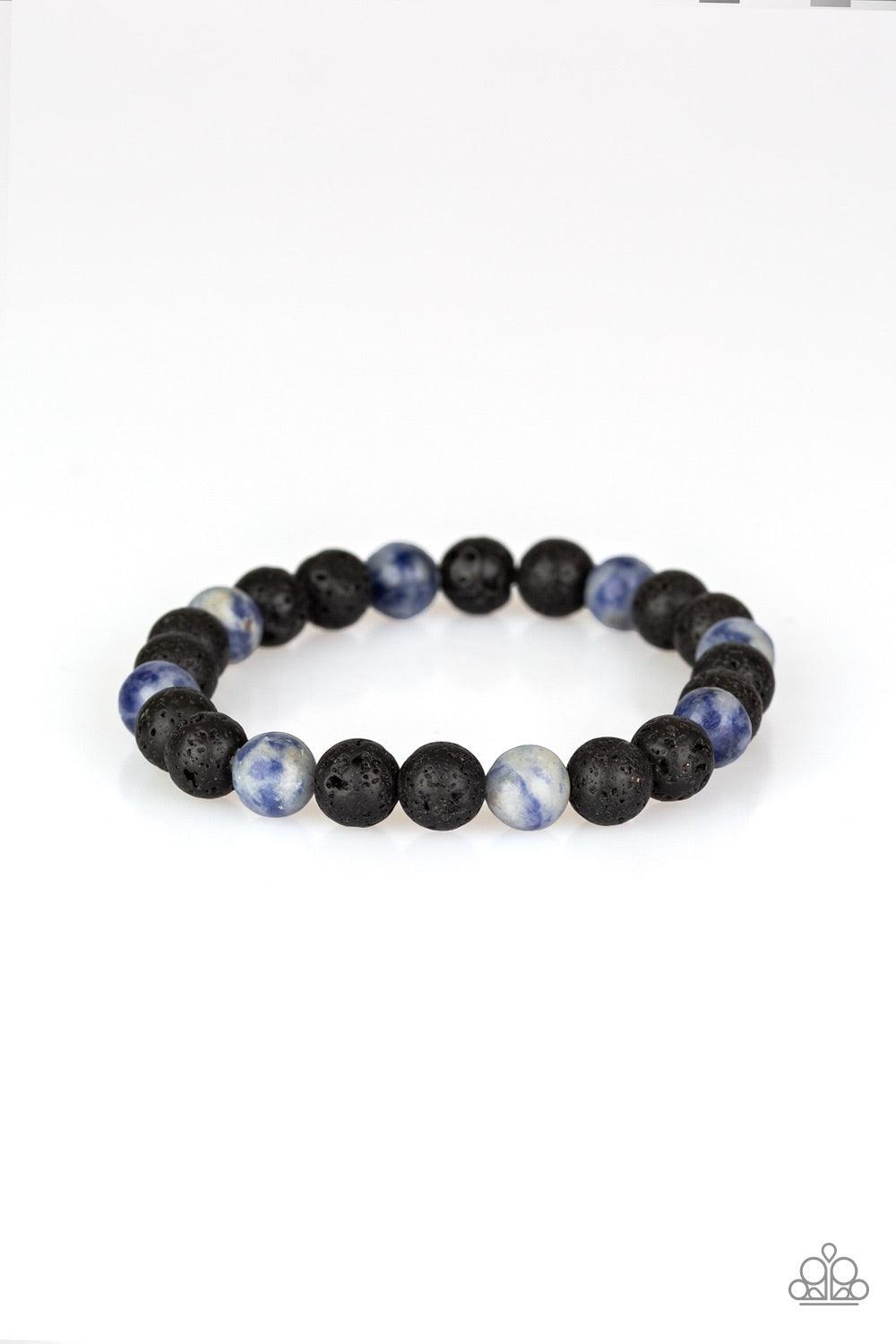 Paparazzi Accessories Top Ten Zen - Blue A collection of black lava rock and tranquil blue stone beads are threaded along a stretchy band around the wrist for a seasonal look. Jewelry