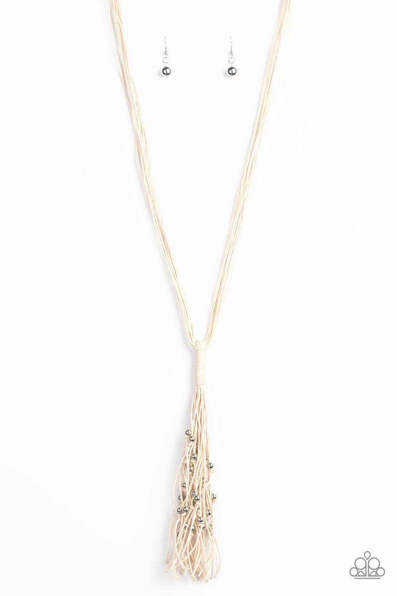 Paparazzi Accessories Hand-Knotted Knockout - White Hand-Knotted Knockout White – Paparazzi Necklace. Shiny silver beads are knotted in place along strands of white cording that have been knotted into an edgy tassel at the bottom of matching lengthened co