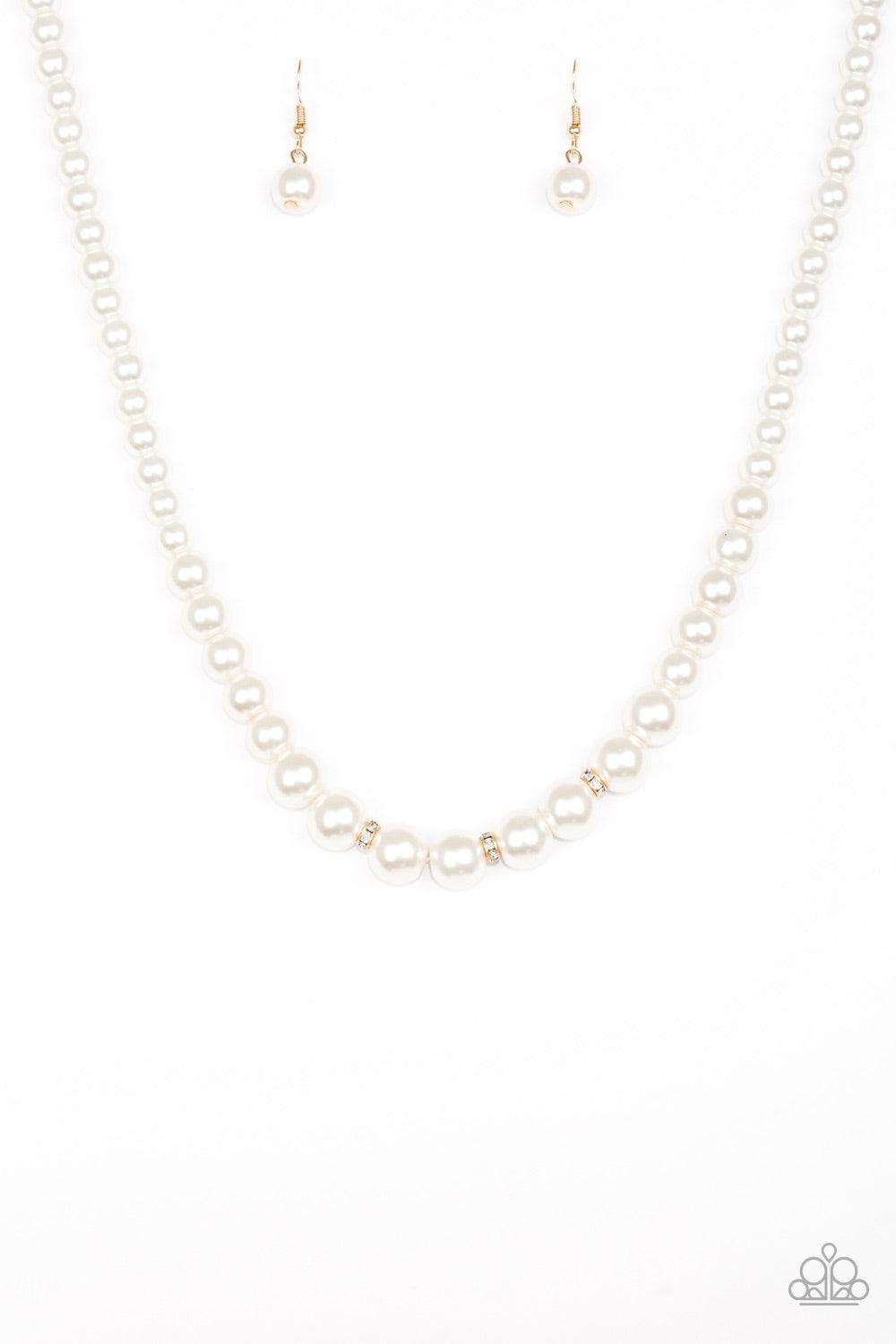 Paparazzi Accessories Royal Romance - Gold Gradually increasing in size near the center, a strand of luminescent white pearls falls just below the collar. White rhinestone encrusted rings are sprinkled along the center for a timeless finish. Features an a