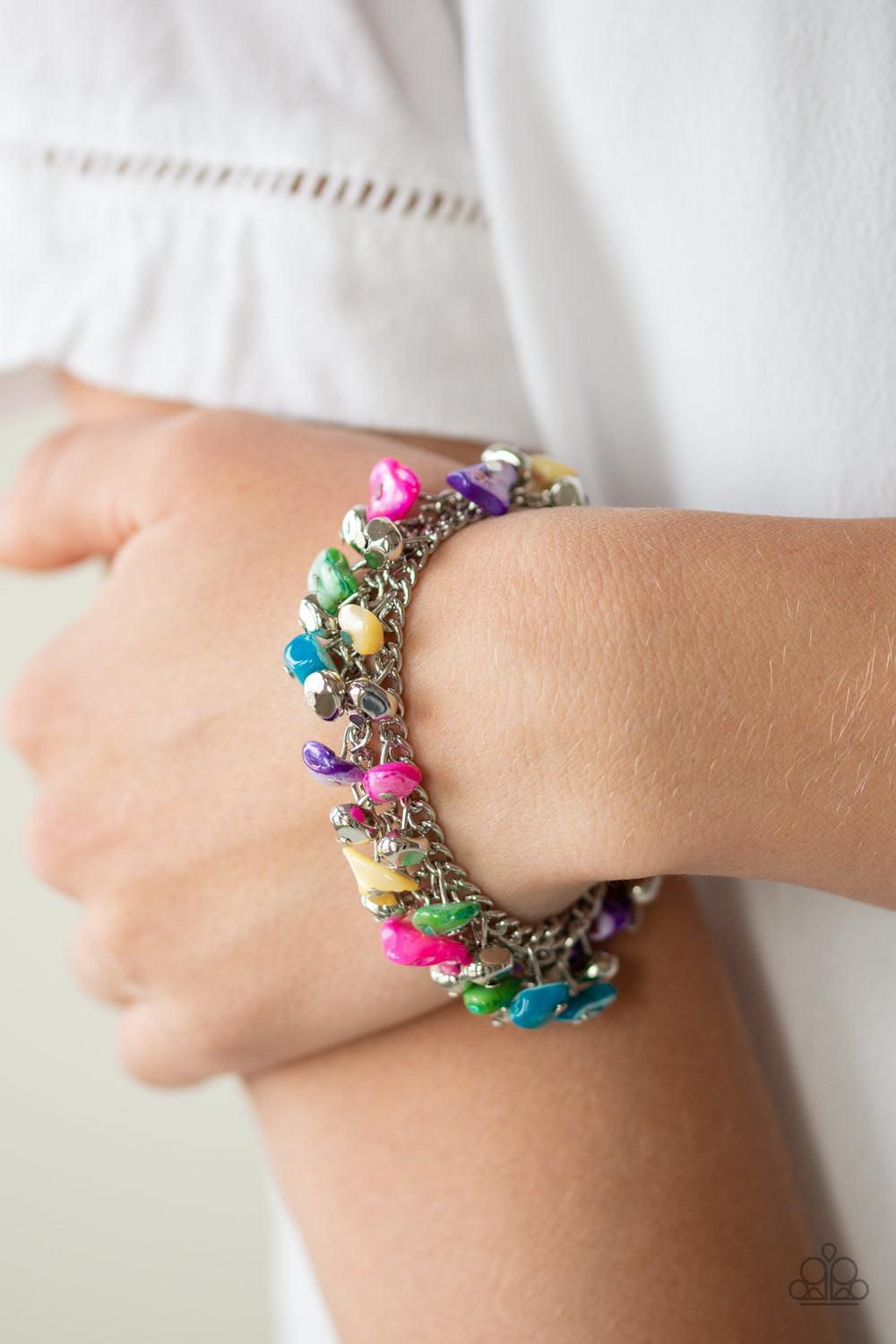 Paparazzi Accessories Plentiful Pebbles - Multi Two strands of vivacious multicolored pebbles and faceted silver beads swing from two layered chains, creating a colorful fringe around the wrist. Features an adjustable clasp closure. Jewelry